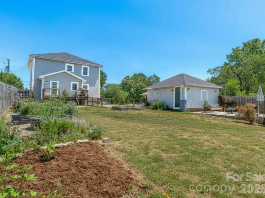 310 Hazel Mill Road, Asheville, NC 28806.  MLS# CAR4385682, YatesRealty ID 28409. Expansive backyard
