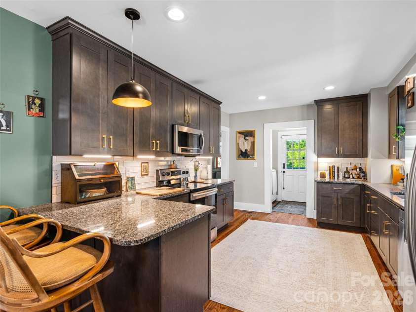 310 Hazel Mill Road, Asheville, NC 28806.  MLS# CAR4385682, YatesRealty ID 28409. Updated kitchen with stone countertops