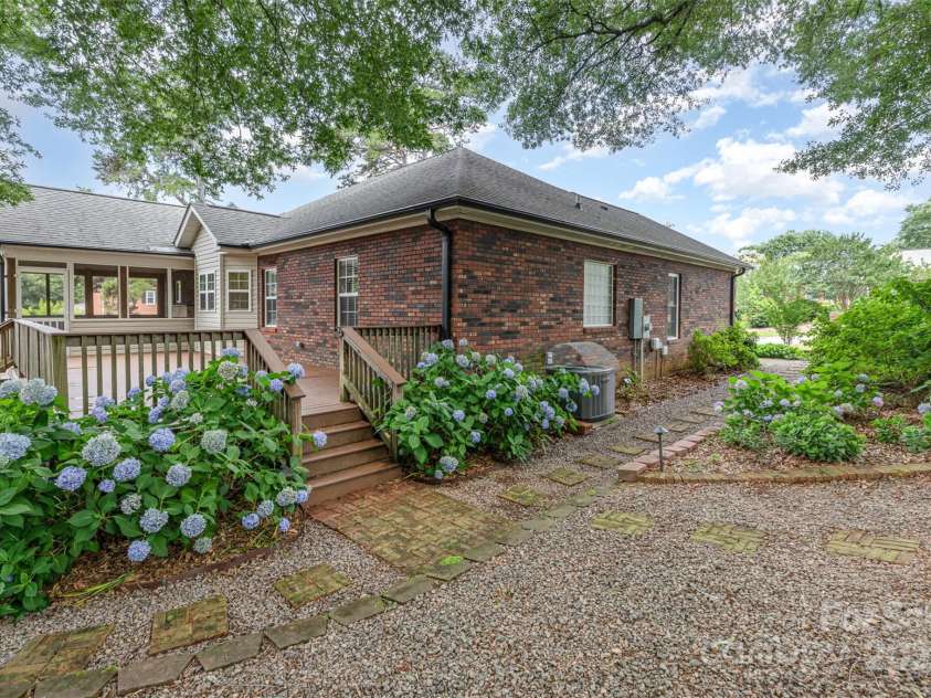 43 Paddington Drive, Concord, NC 28025.  MLS# CAR4270553, YatesRealty ID 28409. Beautifully sculped landscaping