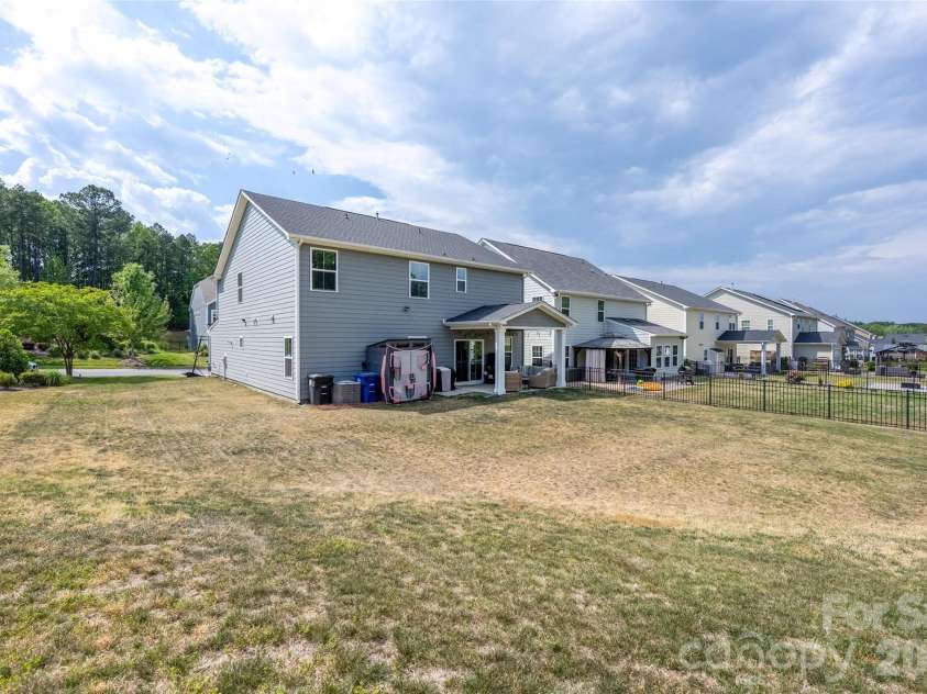 120 Welcombe Street, Mooresville, NC 28115.  MLS# CAR4386404, YatesRealty ID 28412. Spacious backyard