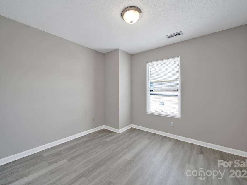 2707 Cochrane Drive, Charlotte, NC 28269.  MLS# CAR4283122, YatesRealty ID 28412. Secondary Bedroom