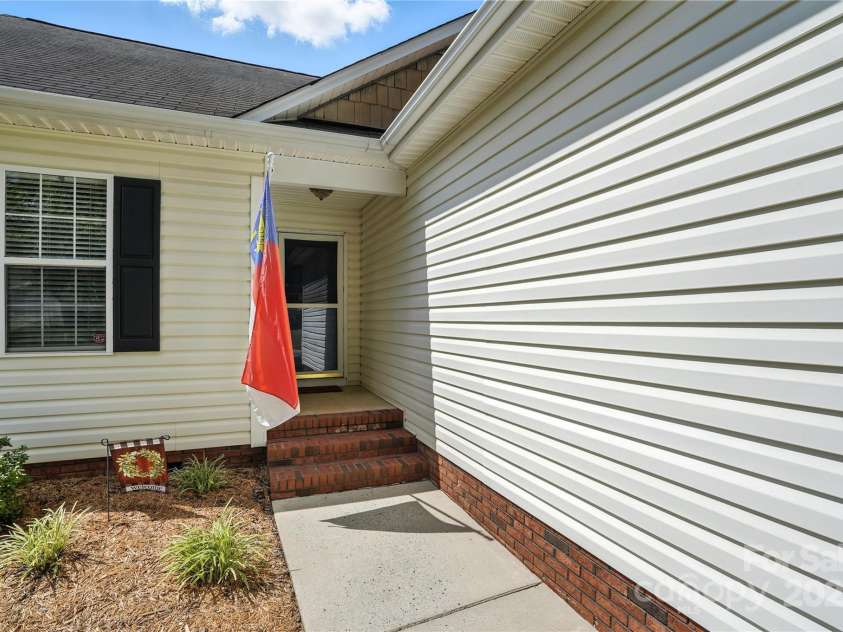 407 Riverwalk Drive, Concord, NC 28027.  MLS# CAR4284320, YatesRealty ID 28417. 