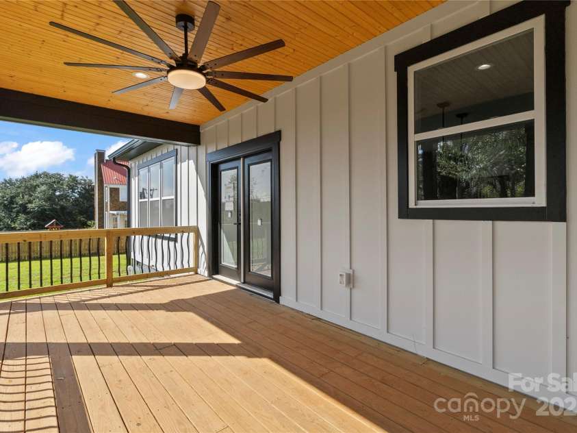 2589 Polo Lane, Maiden, NC 28650.  MLS# CAR4299931, YatesRealty ID 28419. Great view of rear of home. The rear covered deck is beautiful. No septic in back yard so a small pool is a possibility.