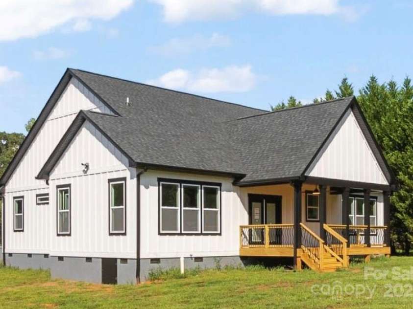 2589 Polo Lane, Maiden, NC 28650.  MLS# CAR4299931, YatesRealty ID 28419. View from rear of home. Gorgeous over size covered rear deck. Large crawlspace area. extra storage