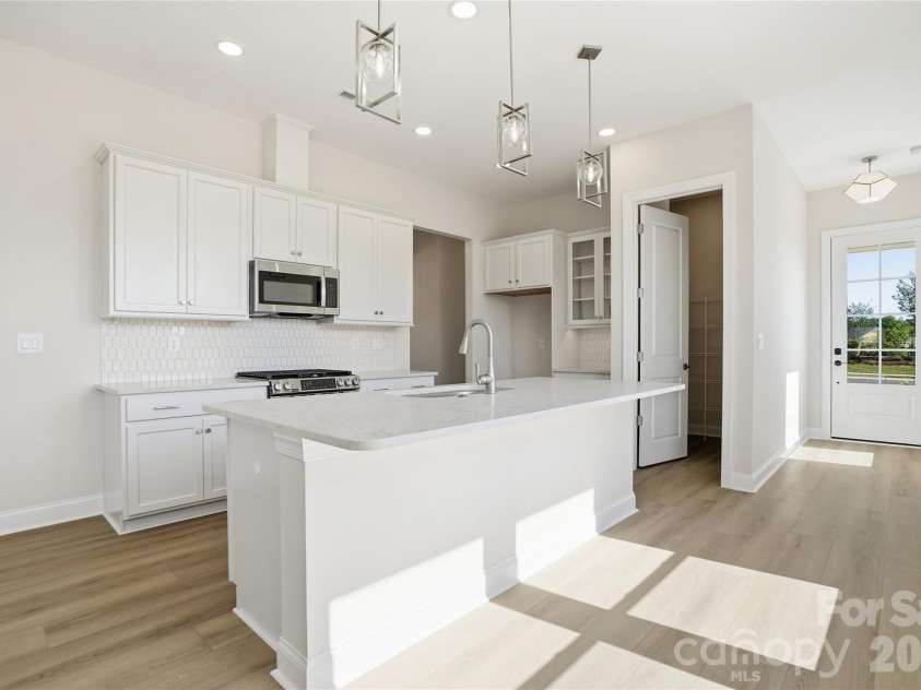 207 Patagonia Place, Locust, NC 28097.  MLS# CAR4385689, YatesRealty ID 28420. Kitchen 