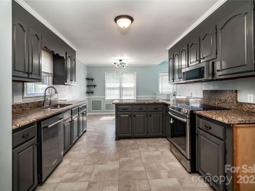 732 Deerfield Drive, Mount Holly, NC 28021.  MLS# CAR4285514, YatesRealty ID 28423. 