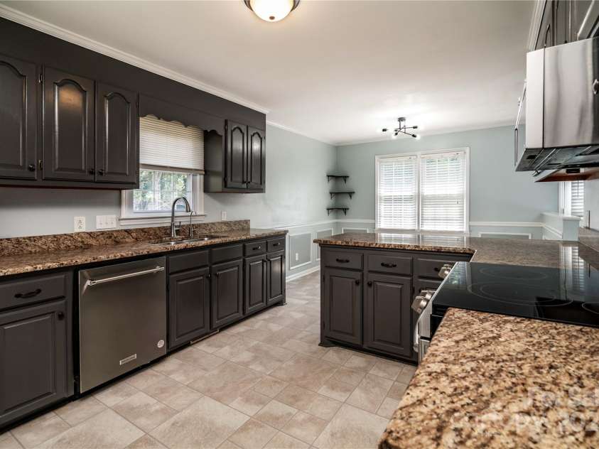 732 Deerfield Drive, Mount Holly, NC 28021.  MLS# CAR4285514, YatesRealty ID 28423. 