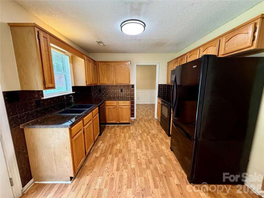 8004 Glencannon Drive, Charlotte, NC 28227.  MLS# CAR4390341, YatesRealty ID 28428. 