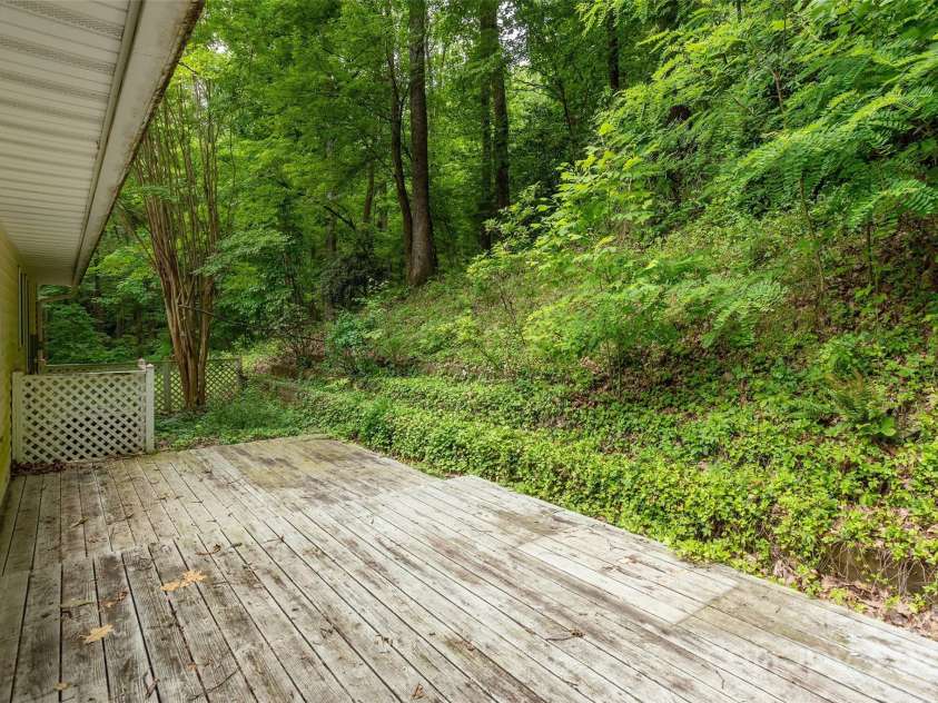 104 Creekstone Lane, Hendersonville, NC 28791.  MLS# CAR4285829, YatesRealty ID 28429. Back Deck overlooking private woods