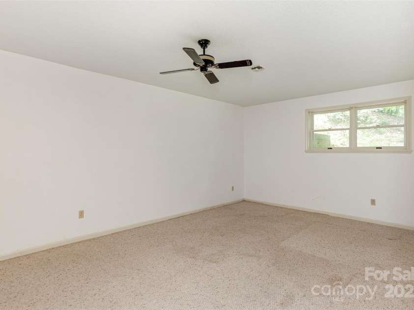 104 Creekstone Lane, Hendersonville, NC 28791.  MLS# CAR4285829, YatesRealty ID 28429. Lower Level Room--Office or Extra Sleeping Area