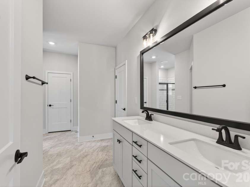 302 Gorham Drive, Albemarle, NC 28001.  MLS# CAR4346563, YatesRealty ID 28434. Primary bathroom