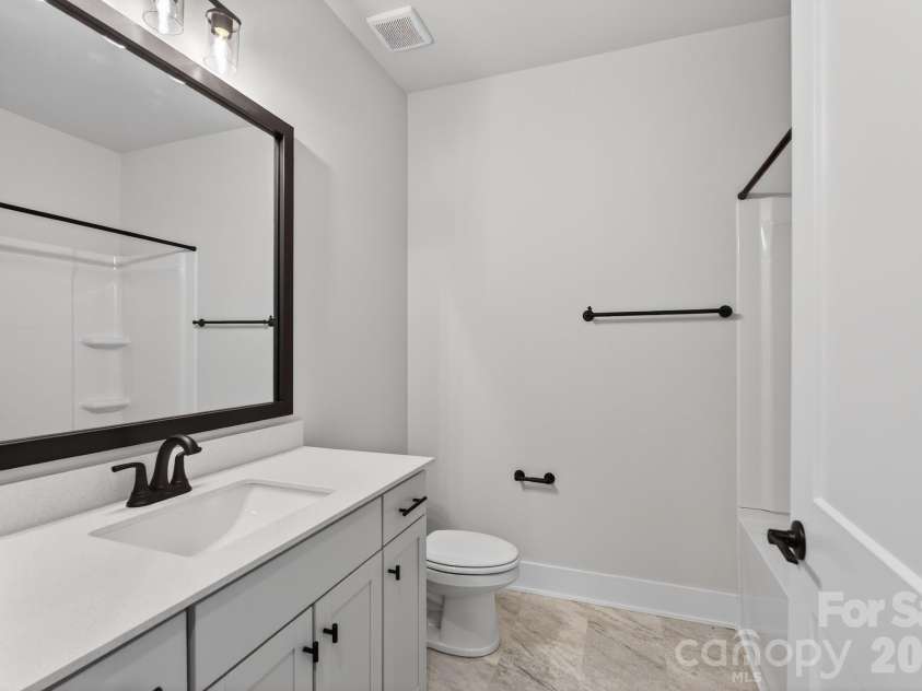 302 Gorham Drive, Albemarle, NC 28001.  MLS# CAR4346563, YatesRealty ID 28434. Secondary bathroom