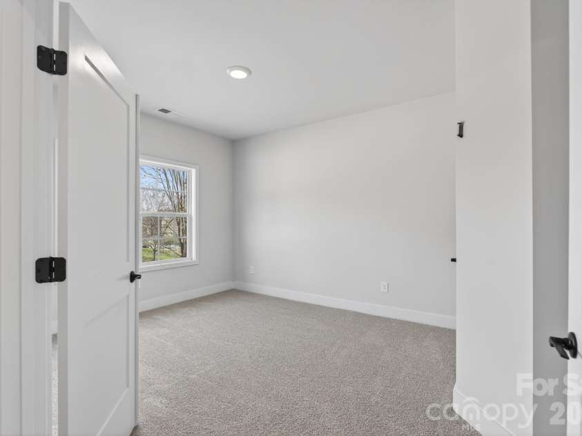 302 Gorham Drive, Albemarle, NC 28001.  MLS# CAR4346563, YatesRealty ID 28434. Study room/bedroom 1