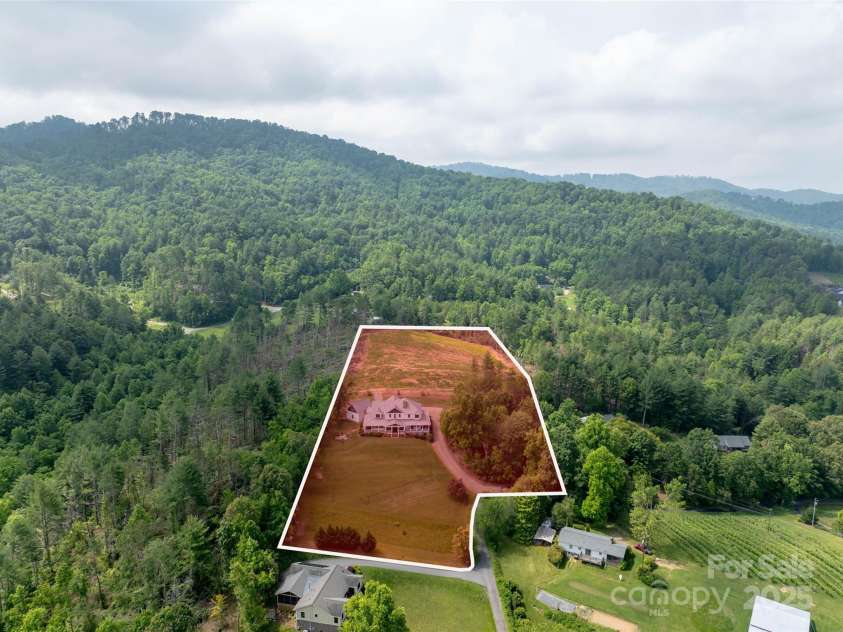 29 Bonnie Brae Drive, Weaverville, NC 28787.  MLS# CAR4266285, YatesRealty ID 28435. 5.33 acres showing the cleared 3 acre pasture in the back of the property. Fully unrestricted with a separate deeded right of way.