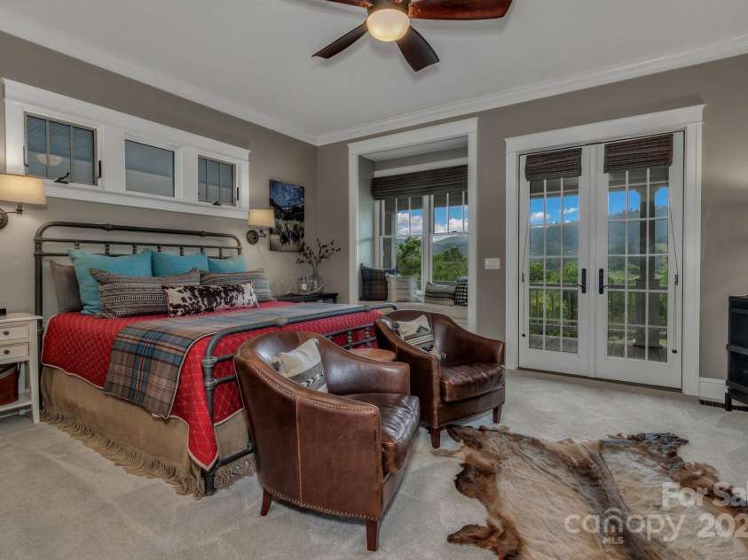 29 Bonnie Brae Drive, Weaverville, NC 28787.  MLS# CAR4266285, YatesRealty ID 28435. Amazing views from the primary bedroom to include custom shelving in large walk-in closet in primary room