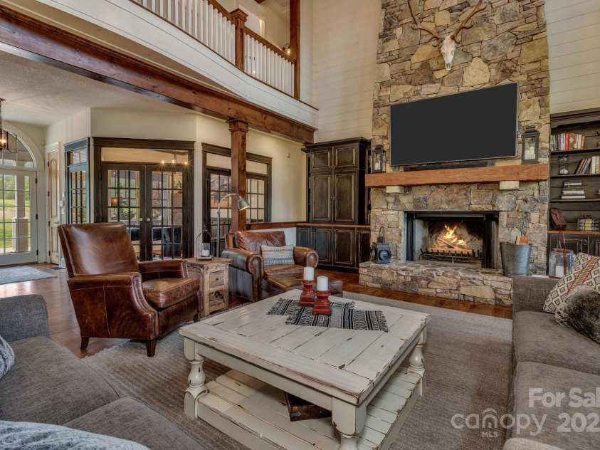 29 Bonnie Brae Drive, Weaverville, NC 28787.  MLS# CAR4266285, YatesRealty ID 28435. Built in shelves/cabinets in living room