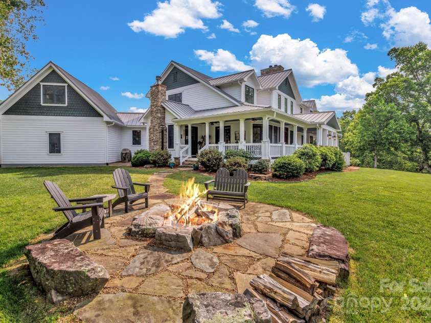 29 Bonnie Brae Drive, Weaverville, NC 28787.  MLS# CAR4266285, YatesRealty ID 28435. Custom stone outdoor firepit
