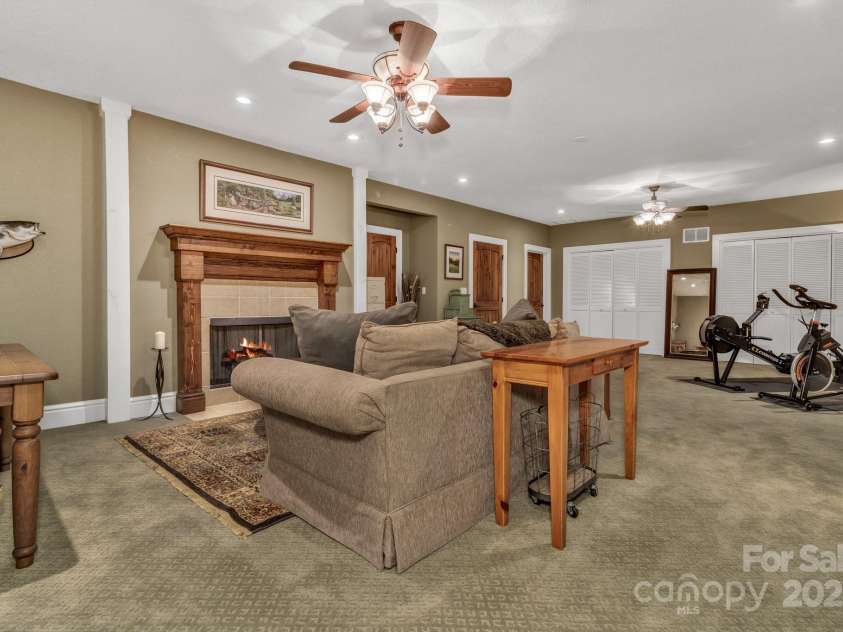 29 Bonnie Brae Drive, Weaverville, NC 28787.  MLS# CAR4266285, YatesRealty ID 28435. Flex room downstairs could be used as bedroom, guest living area, gym, yoga room or so many other options and has a gas log fireplace