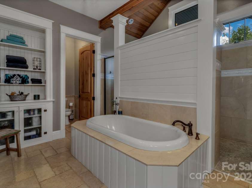 29 Bonnie Brae Drive, Weaverville, NC 28787.  MLS# CAR4266285, YatesRealty ID 28435. Radiant heat flooring in primary bathroom