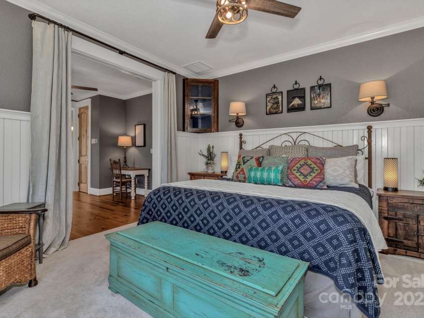 29 Bonnie Brae Drive, Weaverville, NC 28787.  MLS# CAR4266285, YatesRealty ID 28435. Upper level guest suite #1 with a separate sitting area with a fireplace and a full beautiful en-suite and private covered porch.