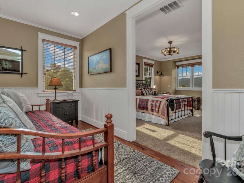 29 Bonnie Brae Drive, Weaverville, NC 28787.  MLS# CAR4266285, YatesRealty ID 28435. Upper level guest suite #2 with a private living room/sitting area.