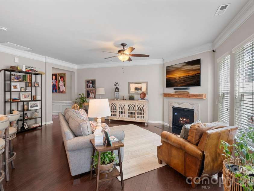 2207 Whitford Lane, Charlotte, NC 28210.  MLS# CAR4366216, YatesRealty ID 28436. Living room with gas fireplace