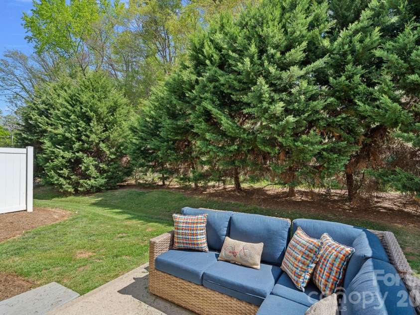 2207 Whitford Lane, Charlotte, NC 28210.  MLS# CAR4366216, YatesRealty ID 28436. Patio backs up to trees