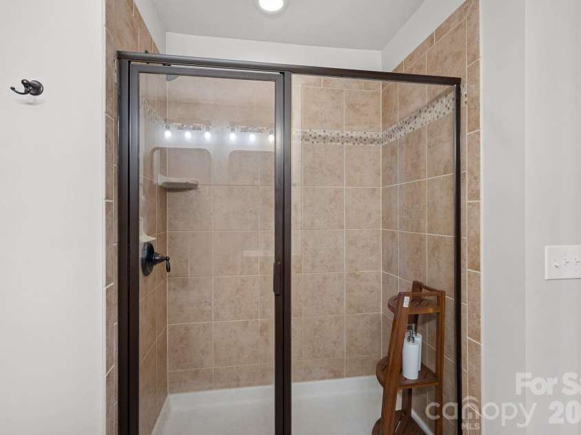 2207 Whitford Lane, Charlotte, NC 28210.  MLS# CAR4366216, YatesRealty ID 28436. Primary Shower