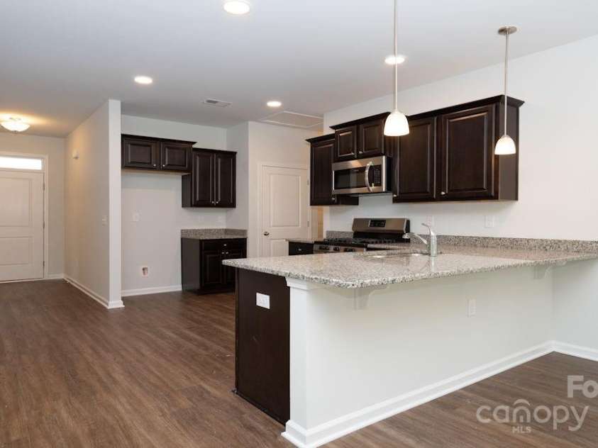 49 Woodvale Drive, Waynesville, NC 28786.  MLS# CAR4280498, YatesRealty ID 28440. Photos are representative