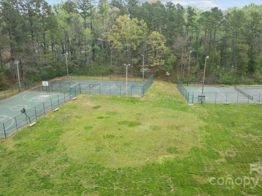 6807 Stoney Ridge Road, Matthews, NC 28104.  MLS# CAR4241286, YatesRealty ID 28444. Tennis Courts