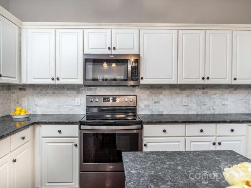 8412 Bridgestone Drive, Huntersville, NC 28078.  MLS# CAR4278792, YatesRealty ID 28445. Honed granite countertops.