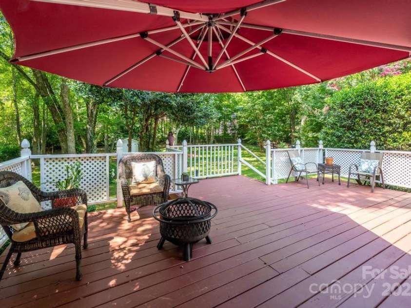 8412 Bridgestone Drive, Huntersville, NC 28078.  MLS# CAR4278792, YatesRealty ID 28445. Large backyard deck for family BBQ's