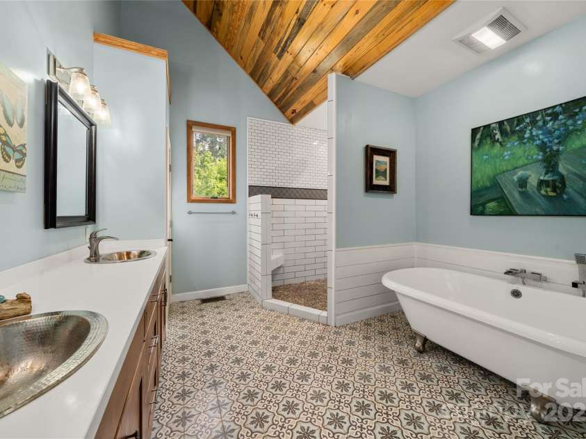 134 Olivia Trace Drive, Fletcher, NC 28732.  MLS# CAR4257309, YatesRealty ID 28446. Beautifully curated primary bathroom must be seen to be appreciated