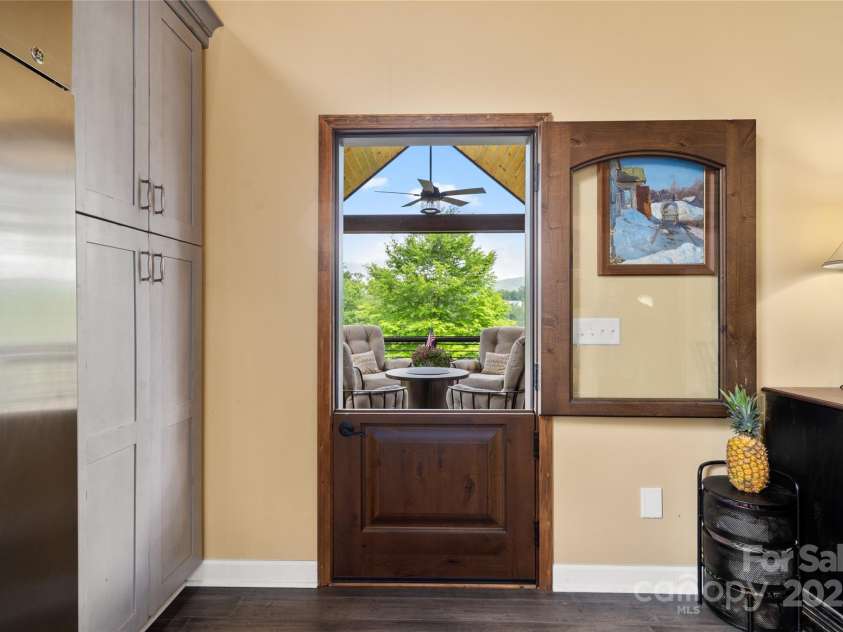 134 Olivia Trace Drive, Fletcher, NC 28732.  MLS# CAR4257309, YatesRealty ID 28446. Lovely stable door leads to covered deck