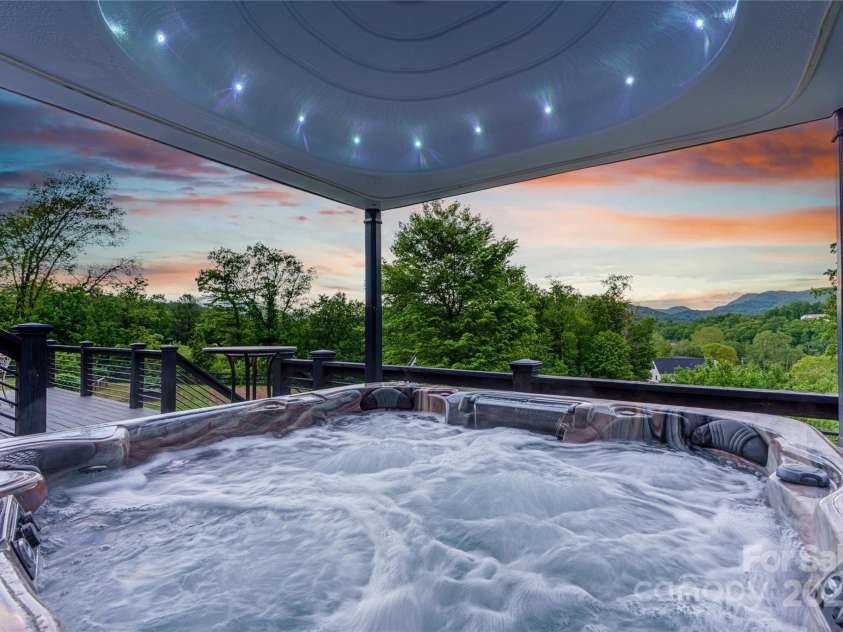 134 Olivia Trace Drive, Fletcher, NC 28732.  MLS# CAR4257309, YatesRealty ID 28446. Luxury hot tub with hydraulic electronic lid and multiple stations