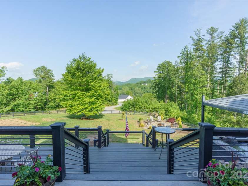 134 Olivia Trace Drive, Fletcher, NC 28732.  MLS# CAR4257309, YatesRealty ID 28446. Multi level decks to enjoy the exquisite grounds