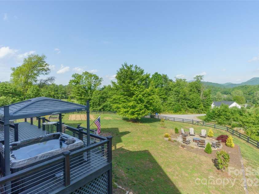 134 Olivia Trace Drive, Fletcher, NC 28732.  MLS# CAR4257309, YatesRealty ID 28446. Multiple fruit trees and raised garden beds