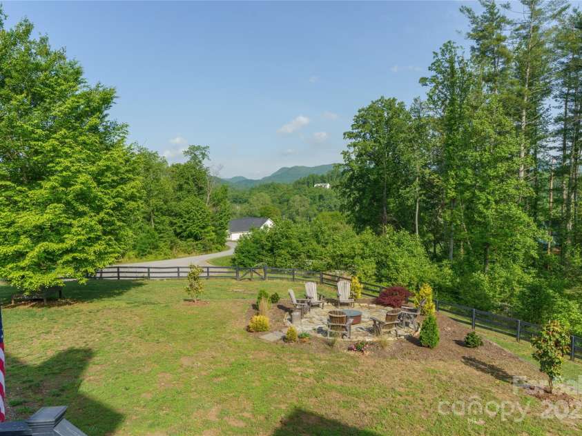 134 Olivia Trace Drive, Fletcher, NC 28732.  MLS# CAR4257309, YatesRealty ID 28446. One and a half acres of grounds for your mini farm!