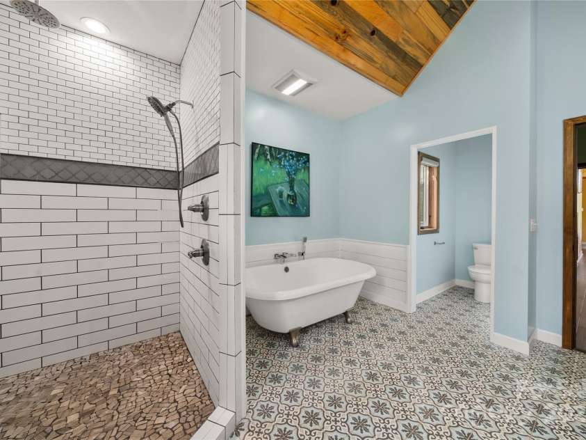 134 Olivia Trace Drive, Fletcher, NC 28732.  MLS# CAR4257309, YatesRealty ID 28446. Primary spa bath with oversized soaking tub