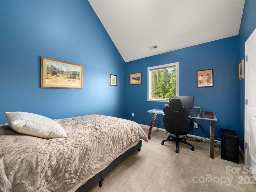 134 Olivia Trace Drive, Fletcher, NC 28732.  MLS# CAR4257309, YatesRealty ID 28446. Spacious upper level bedroom four