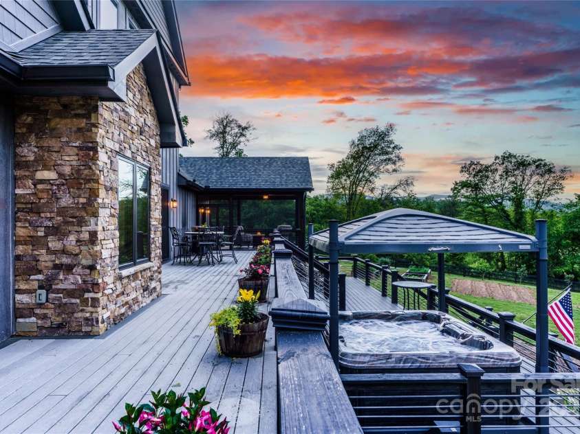 134 Olivia Trace Drive, Fletcher, NC 28732.  MLS# CAR4257309, YatesRealty ID 28446. This custom estate offers resort style living in the mountains with one and a half acres of non restricted space to create your oasis.