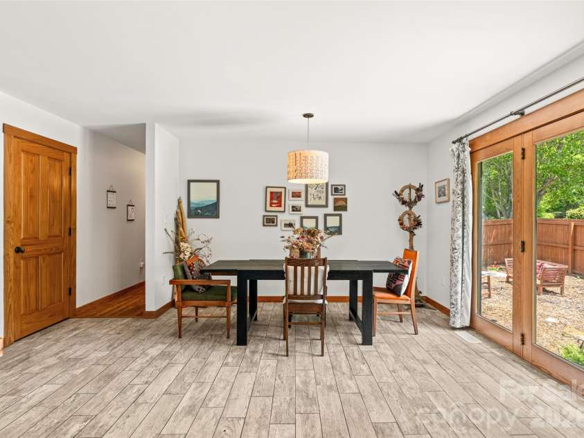 241 Pinners Cove Road, Asheville, NC 28803.  MLS# CAR4385845, YatesRealty ID 28453. Dining area with access to backyard