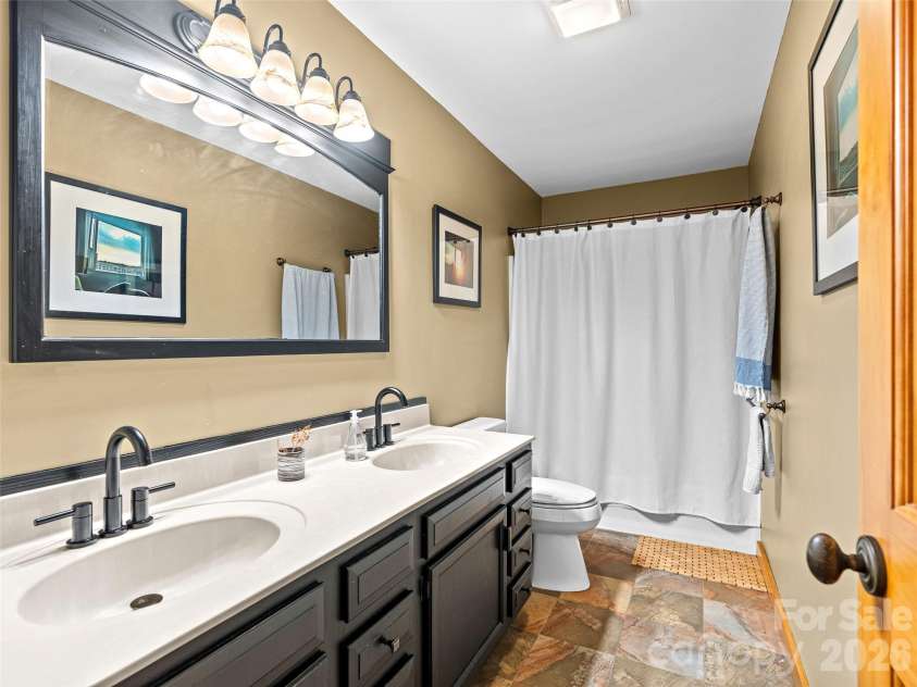 241 Pinners Cove Road, Asheville, NC 28803.  MLS# CAR4385845, YatesRealty ID 28453. Guest bathroom