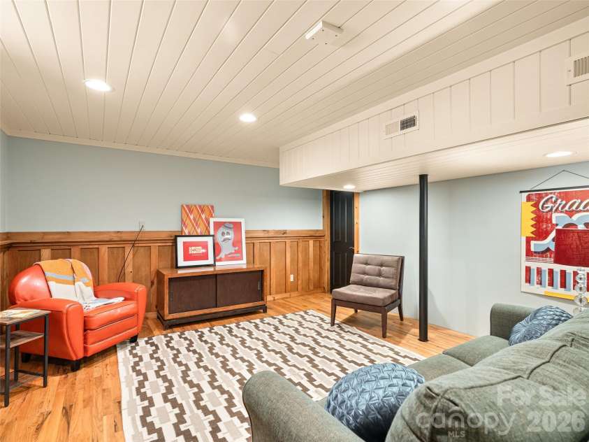 241 Pinners Cove Road, Asheville, NC 28803.  MLS# CAR4385845, YatesRealty ID 28453. Lower level rec room