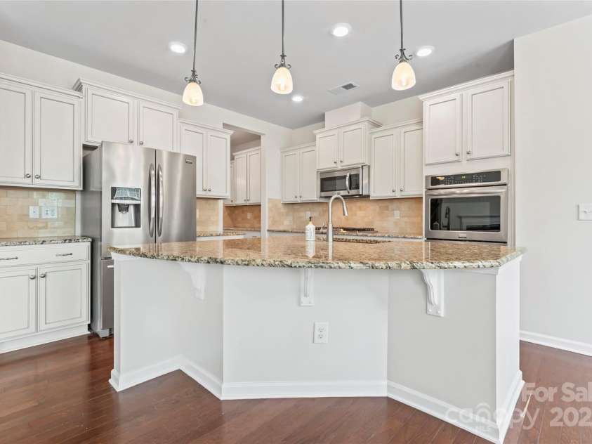 133 Yellowbell Road, Mooresville, NC 28117.  MLS# CAR4267306, YatesRealty ID 28455. Gourmet Kitchen w/double ovens and gas range