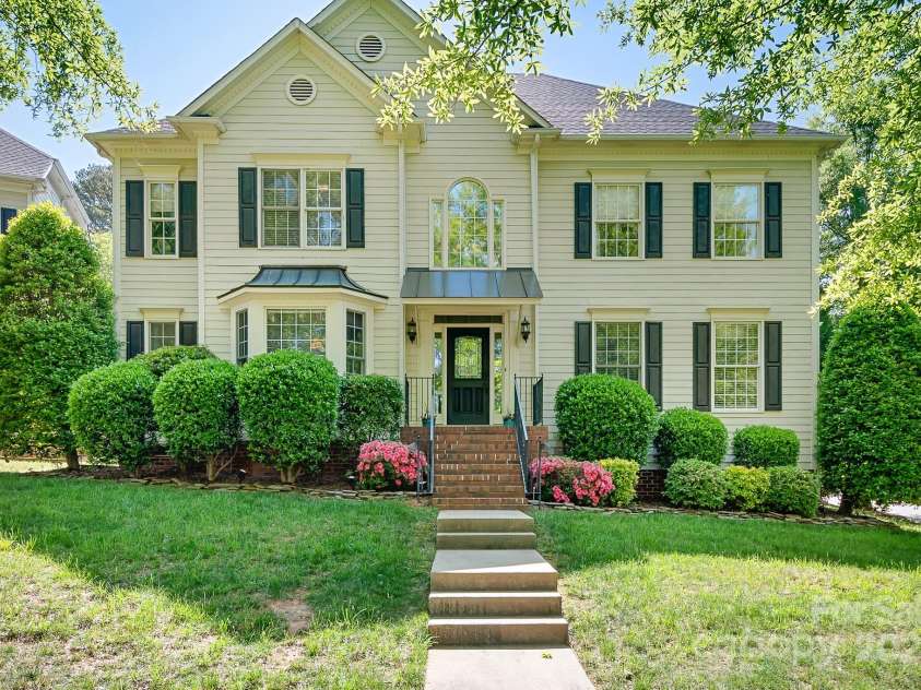 16028 Hallaton Drive, Huntersville, NC 28078.  MLS# CAR4254854, YatesRealty ID 28460. Front of home is directly across the street from clubhouse and pool