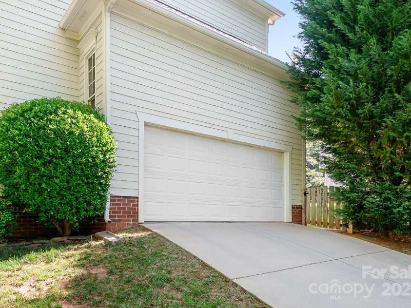16028 Hallaton Drive, Huntersville, NC 28078.  MLS# CAR4254854, YatesRealty ID 28460. Side-load garage