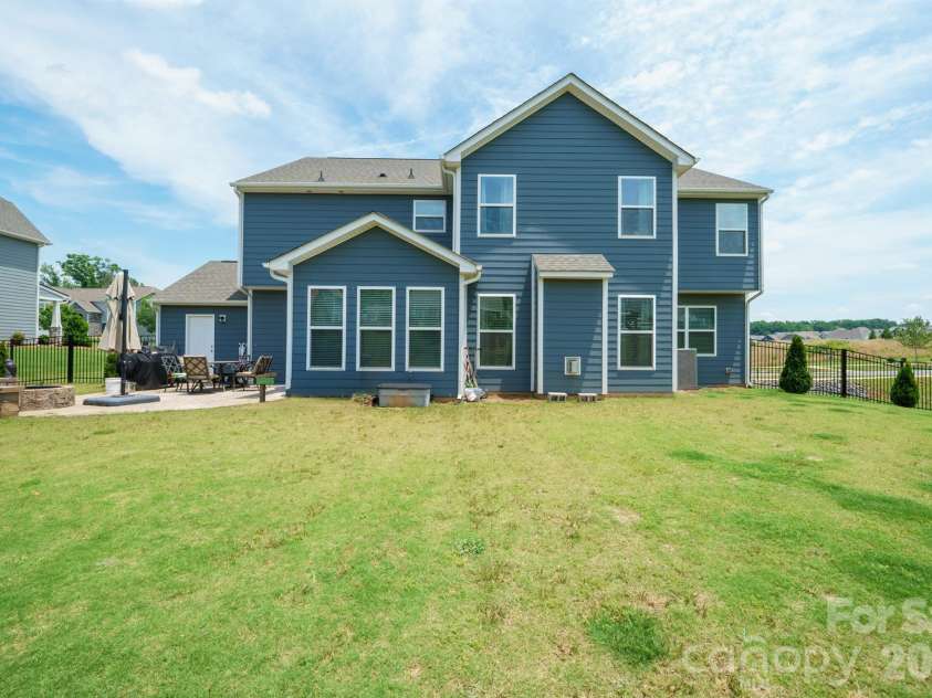 282 Bouchard Drive, Waxhaw, NC 28173.  MLS# CAR4387883, YatesRealty ID 28465. Back of Home