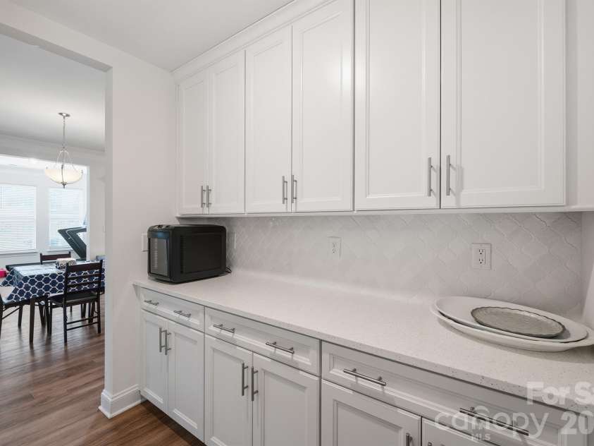 282 Bouchard Drive, Waxhaw, NC 28173.  MLS# CAR4387883, YatesRealty ID 28465. Butler's Pantry Off Dining Room
