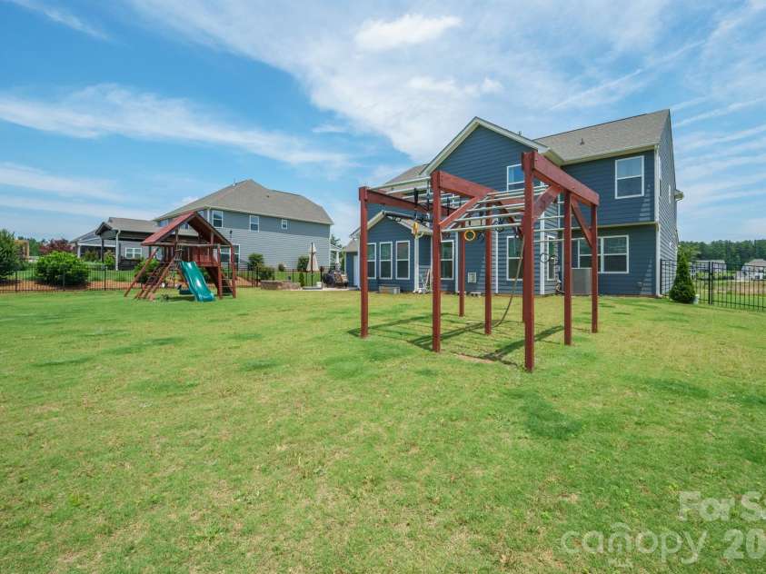 282 Bouchard Drive, Waxhaw, NC 28173.  MLS# CAR4387883, YatesRealty ID 28465. Sitting on Nearly 1/2 acre.